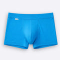 Blue boxer briefs on a light gray background